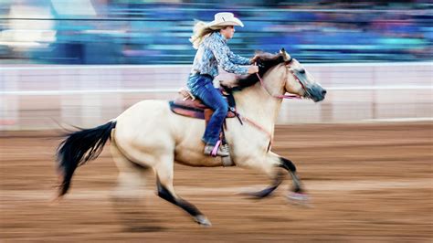 cowgirl rides fast for best time photograph by panoramic images fine
