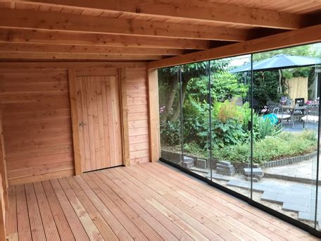 douglas hout veranda met glas overkapping tuinhuis terrasoverkapping rotterdam den haag