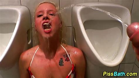 piss slut drinks warm pee in urinal porntube