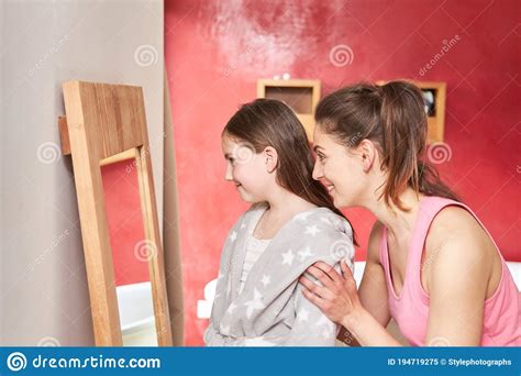 mother and daughter look in the mirror stock image image of talk