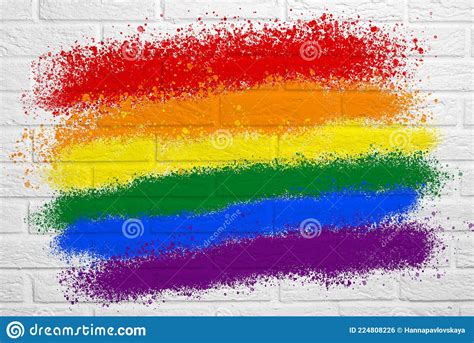 pride illustration white brick wall with the rainbow flag lgbt stock