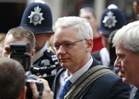 julian assange vows to fight extradition till end cbs news