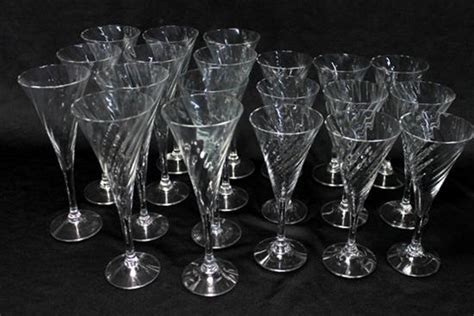 part set  glass flutes  august emporium theodore bruce auctions antiques reporter