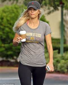 elin nordegren shows off her pert figure as she grabs a coffee with