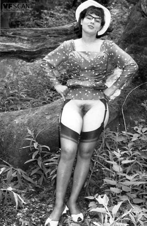 smoking hot retro models lift their skirts to show hairy pussies in the woods