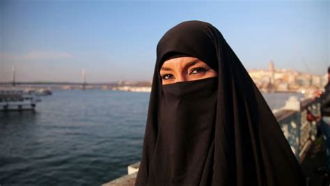 Steadicam Woman With Chador Hijab Wearing Sunglasses