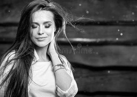 Young Sensual And Beauty Brunette Woman Pose On Wooden Background Black