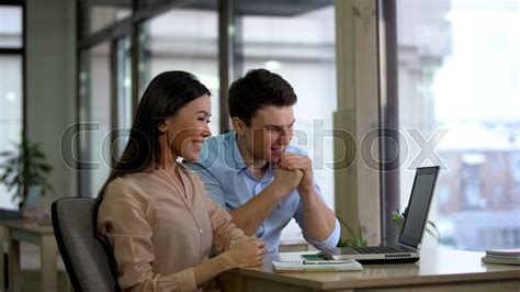 Young Smiling Colleagues Looking Laptop Stock Image Everypixel