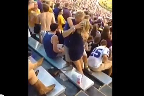 Amorous Couple Making Out At Football Game Falls Big Time