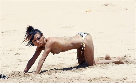 bai ling topless in on the beach in hawaii 1 celebrity