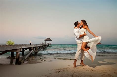 newlyweds at viceroy riviera maya beach for sunset viceroyhotel