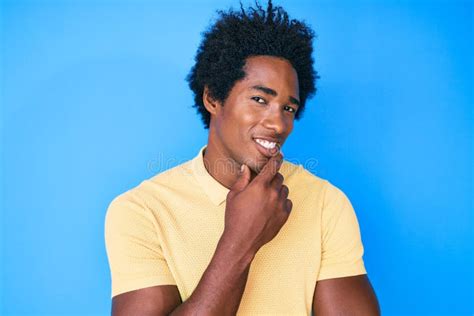 Handsome African American Man With Afro Hair Wearing Casual Clothes