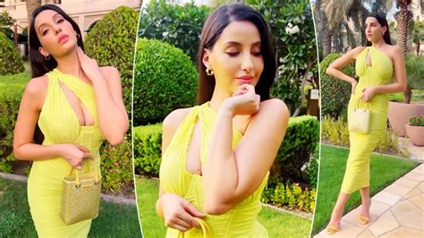 Nora Fatehi Flaunts Her Svelte Figure In A Body Hugging Neon Dress With