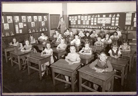 my dad in a creepily perfect classroom photo 1956
