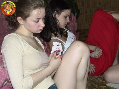 four awesome teen girls with hot nubile bodies playing cards and stripping ass point