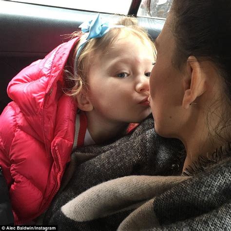 alec baldwin shares photo of wife hilaria kissing daughter daily mail