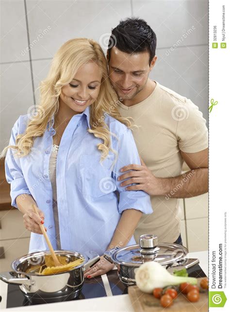 Loving Couple Cooking Together Royalty Free Stock Image
