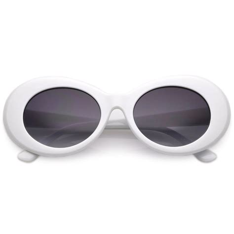 Retro White Oval Sunglasses With Tapered Arms Neutral Colored Gradient
