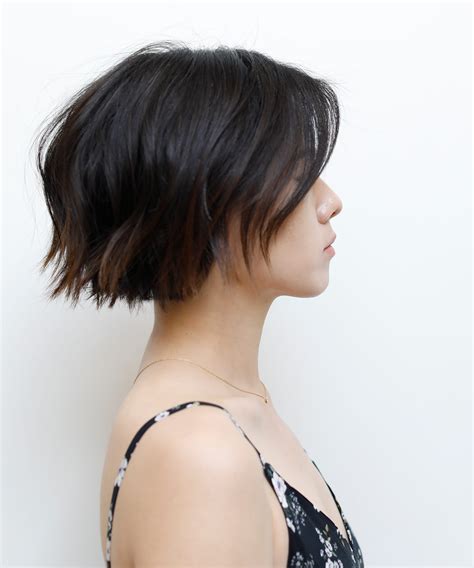 cutting the undercut to make a bob wavy haircut