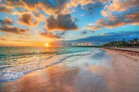 bright  dynamic sea beach sunrise  bright blue skies  yacht