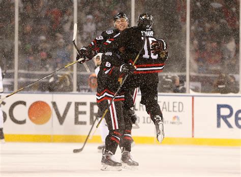 blackhawks rout penguins 5 1 in snowy conditions in nhl stadium series game
