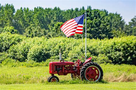 symbols  american farming tractor  flag regeneration international