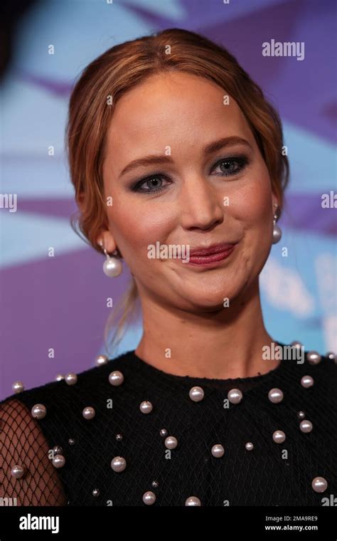 Jennifer Lawrence Poses For Photographers Upon Arrival For The Premiere