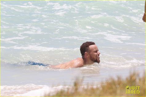 full sized photo of shirtless steph curry hits the beach with wife