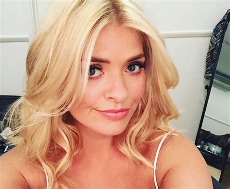 holly willoughby lifts skirt in cheeky flash video daily