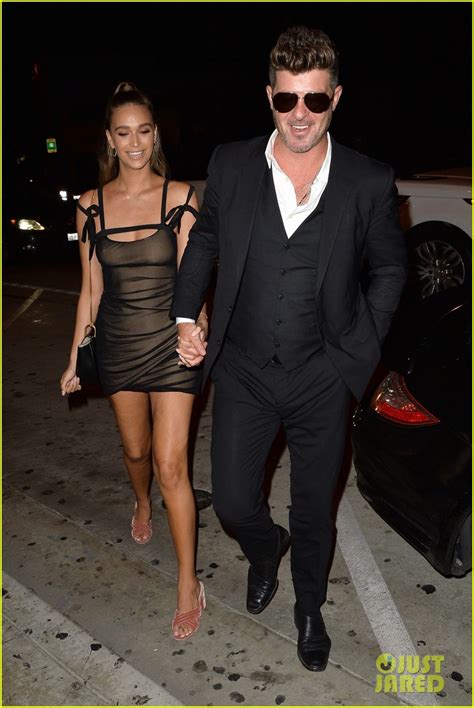 robin thicke and april love geary arrive for their party to