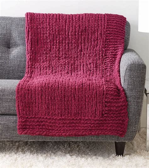 How To Make A Bernat® Blanket Extra™ Simple Stitch Knit Afghan Joann