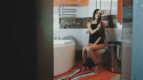 Girl Sitting On Toilet Balck Stock Footage Video 100