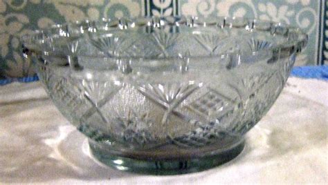 smal pressed glass serving bowl with star and diamond pattern