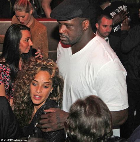 photos shaquille o neal kisses recent college grad laticia rolle in paris club atlanta