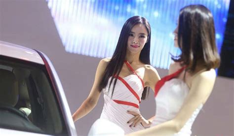 scantily clad models are still the driving force behind car shows in china