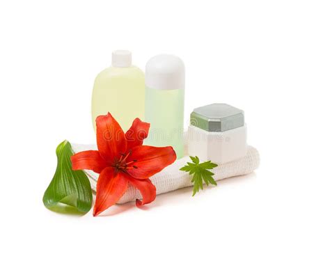 red lily spa stock photo image  white bottle background