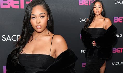 Jordyn Woods Steps Out In Black Dress At Premiere In First Appearance