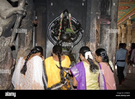 Female Worshipers Praying In Front Of A Ganesh Shrine Meenakshi Temple