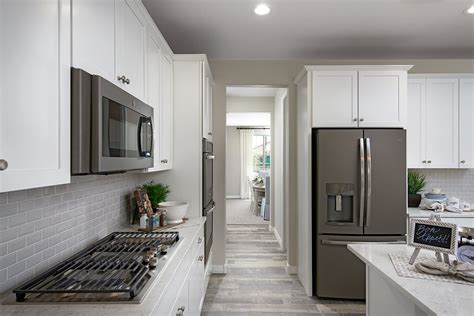 Slate Appliances In White Kitchen Home Inspiration