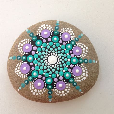 pin  kathe striffler   stones mandala rock art mandala painted