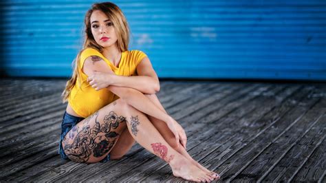sexy cute and beautiful tattooed pierced blonde teen girl