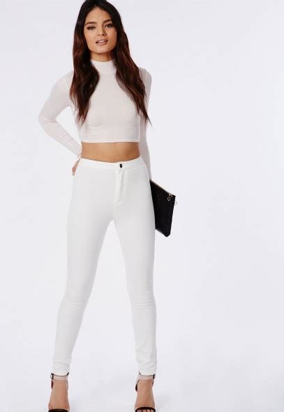 kim kardashian wears skintight white jeans on lego store