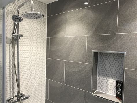 topps tiles regal wave mist grey tiles  white mosaics bathroom