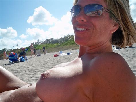 Enjoying Showing Off While Getting An All Over Tan At