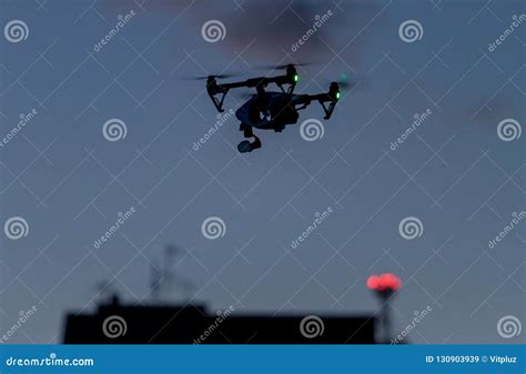 drone flying   building  night time spying  quadcopter stock image image