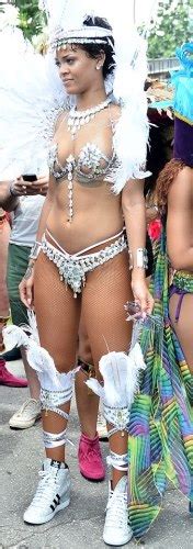 checkout what rihanna wore during barbados parade photo