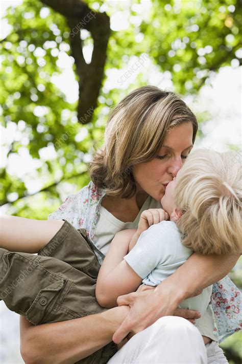 Mother Kissing Son Stock Image F003 7380 Science Photo Library