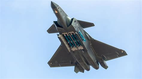 chinas stealth fighter jets feature missiles  airshow show