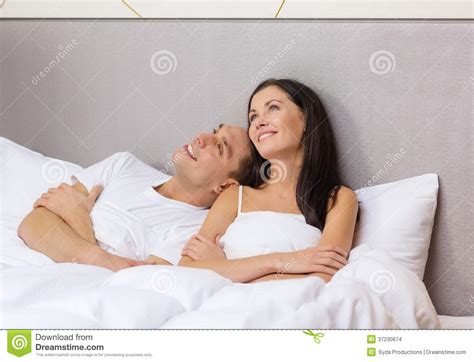 Happy Couple Dreaming In Bed Stock Images Image 37230674