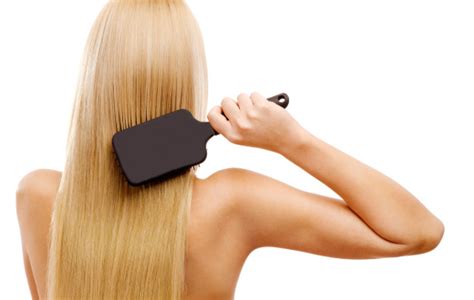 combing stock photo  image  hairbrush restoring beauty